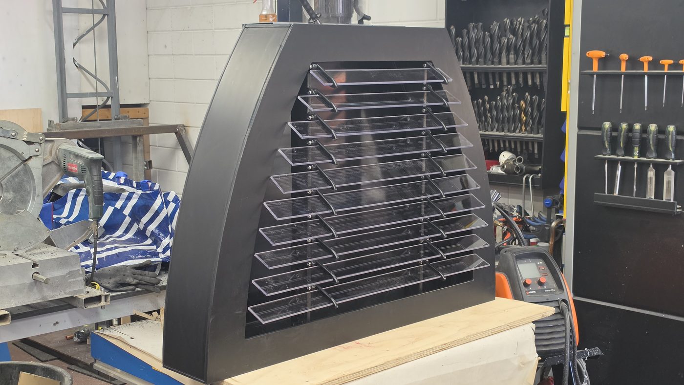 Lamellenrooster in HDPE met doorzichtige lexaan lamellen